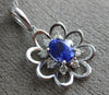 ESTATE .47CT DIAMOND & AAA TANZANITE 14KT WHITE GOLD 3D CLASSIC FLOWER PENDANT