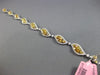 ESTATE 7.18CT FANCY INTENSE MULTI COLOR DIAMOND 18KT GOLD WAVE TENNIS BRACELET