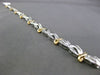 ESTATE 2.0CT BAGUETTE DIAMOND 14KT WHITE & YELLOW GOLD INFINITY TENNIS BRACELET