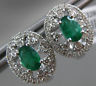 ESTATE 1.32CT DIAMOND & AAA EMERALD 14KT WHITE GOLD OVAL FLOWER HUGGIE EARRINGS
