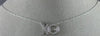 ESTATE .15CT DIAMOND 14K WHITE GOLD 3D DANCING DIAMOND XO FLOATING LOVE NECKLACE