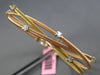 ESTATE .30CT DIAMOND 14KT WHITE & ROSE GOLD CRISS CROSS FLEXIBLE BANGLE BRACELET