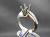 ESTATE .72CT ROUND & BAGUETTE CUT DIAMOND PLATINUM 3D SEMI MOUNT ENGAGEMENT RING