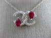 ESTATE 1.26CT DIAMOND & AAA RUBY 14KT WHITE GOLD CIRCLE OF LIFE FLOATING PENDANT