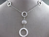 ESTATE .16CT DIAMOND 14KT WHITE GOLD CIRCULAR CLUSTER OPEN BY THE YARD NECKLACE