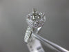 ESTATE .44CT DIAMOND 14KT WHITE GOLD 3D CLASSIC HALO SEMI MOUNT ENGAGEMENT RING