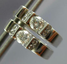 ESTATE .74CT DIAMOND 18KT WHITE GOLD 3D SOLITAIRE ETOILE HUGGIE EARRINGS #284