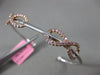 ESTATE .87CT WHITE & PINK DIAMOND 18K WHITE & ROSE GOLD INFINITY BANGLE BRACELET