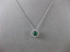 ESTATE .41CT DIAMOND & EMERALD 18KT WHITE GOLD CLASSIC HALO FLOATING PENDANT E/F