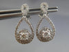 ESTATE .80CT DIAMOND 14KT WHITE GOLD SOLITAIRE INFINITY FLOWER HANGING EARRINGS