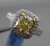ESTATE 1.89CT GIA FANCY YELLOW DIAMOND 18KT WHITE GOLD HALO ENGAGEMENT RING
