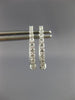 ESTATE .25CT DIAMOND 14KT WHITE GOLD 3D CLASSIC OVAL HUGGIE HOOP EARRINGS