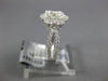 ESTATE .94CT ROUND DIAMOND 18KT WHITE GOLD 3D CLASSIC FLOWER CLUSTER LOVE RING