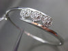 ESTATE .10CT DIAMOND 14KT WHITE GOLD THREE STONE FLOWER CLUSTER BANGLE BRACELET