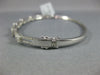 1.24CT DIAMOND 18KT WHITE GOLD 3D FLOWER CLUSTER SEMI ETERNITY BANGLE BRACELET