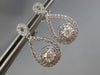 ESTATE .80CT DIAMOND 14KT WHITE GOLD SOLITAIRE INFINITY FLOWER HANGING EARRINGS