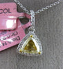 ESTATE .94CT WHITE & FANCY YELLOW DIAMOND 18KT 2 TONE GOLD HALO TRILLION PENDANT