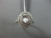 ESTATE LARGE .71CT DIAMOND 14KT WHITE GOLD OVAL HALO SEMI MOUNT ENGAGEMENT RING