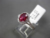 ESTATE 1.34CT DIAMOND & RUBY 18KT WHITE GOLD DOUBLE BAND HALO ENGAGEMENT RING