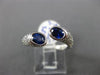 ESTATE 1.72CT DIAMOND & AAA OVAL SAPPHIRE 18KT WHITE GOLD CRISS CROSS LOVE RING