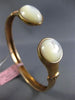 ESTATE .10CT DIAMOND & AAA MOON STONE 14KT ROSE GOLD TWO STONE BANGLE BRACELET