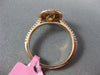 ESTATE .71CT WHITE & FANCY YELLOW DIAMOND 18KT YELLOW GOLD HALO ENGAGEMENT RING