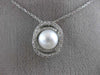 ESTATE .18CT DIAMOND & AAA SOUTH SEA PEARL 14KT WHITE GOLD 3D LOVE KNOT PENDANT