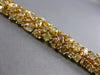 ESTATE WIDE 25.30CT WHITE FANCY NATURAL YELLOW DIAMOND 18K GOLD TENNIS BRACELET