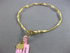 ESTATE .12CT DIAMOND 14KT TWO TONE GOLD 3D SQUARE HEART FLEXIBLE SWIRL BRACELET