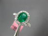 ESTATE WIDE 1.23CT DIAMOND & AAA EMERALD 18KT WHITE GOLD 3D HALO ENGAGEMENT RING