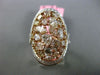 ESTATE EXTRA LARGE 3.78CT FANCY MULTI COLOR DIAMOND 18KT GOLD OVAL INFINITY RING