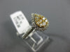 .83CT WHITE & FANCY YELLOW DIAMOND 14KT TWO TONE GOLD PEAR SHAPE HALO LOVE RING