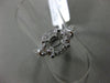 ESTATE .64CT DIAMOND 18KT WHITE GOLD 3D FOUR PRONG 3 STONE HALO ENGAGEMENT RING