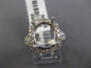 ESTATE LARGE .80CT DIAMOND 14KT WHITE GOLD OVAL HALO SEMI MOUNT ENGAGEMENT RING