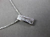 ESTATE .20CT BAGUTTE & ROUND DIAMOND 14K WHITE GOLD RECTANGULAR FLOATING PENDANT