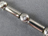 ESTATE .76CT DIAMOND 14KT WHITE GOLD 3D ETOILE BEZEL BY THE YARD TENNIS BRACELET