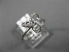 ESTATE .12CT DIAMOND 14KT WHITE GOLD 3D FLOWER LOVE KNOT FUN FRIENDSHIP RING