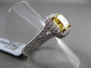 ESTATE 2.26CTW GIA FANCY YELLOW DIAMOND 18KT WHITE GOLD HALO ENGAGEMENT RING