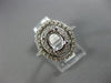 ESTATE LARGE .71CT DIAMOND 14KT WHITE GOLD OVAL HALO SEMI MOUNT ENGAGEMENT RING