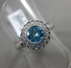 ESTATE WIDE 1.27CT DIAMOND & AAA BLUE TOPAZ 14KT WHITE GOLD HALO ENGAGEMENT RING