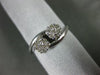 ESTATE .25CT DIAMOND 14KT WHITE GOLD DOUBLE FLOWER CLUSTER CRISS CROSS LOVE RING