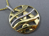 ESTATE LARGE .25CT DIAMOND 18KT WHITE & YELLOW GOLD CIRCULAR CRISS CROSS PENDANT