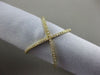 ESTATE .11CT ROUND DIAMOND 18KT YELLOW GOLD 3D CLASSIC CRISS CROSS OPEN FUN RING