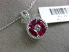ESTATE .94CT ROUND DIAMOND & AAA RUBY 18KT WHITE GOLD CIRCULAR FLOATING PENDANT
