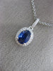 ESTATE 1.21CT DIAMOND & AAA SAPPHIRE 14KT WHITE GOLD OVAL HALO FLOATING PENDANT