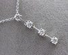 ESTATE .28CT DIAMOND 18KT WHITE GOLD 4 STONE CLASSIC FLOATING PENDANT & CHAIN