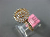 ESTATE .66CT ROUND & BAGUETTE DIAMOND 18KT ROSE GOLD 3D FLOWER HEART LOVE RING