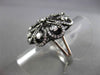 ANTIQUE LARGE 1.14CT DIAMOND 18KT WHITE & BLACK GOLD ETOILE FLOWER FUN RING