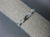 ESTATE .15CT DIAMOND 14KT WHITE GOLD 3D INFINITY SEMI ETERNITY ANNIVERSARY RING