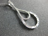 ESTATE .46CT ROUND & BAGUETTE DIAMOND 14KT WHITE GOLD TEAR DROP FLOATING PENDANT